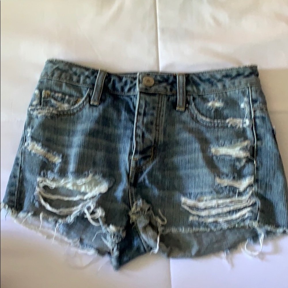 Distressed medium wash jean shorts